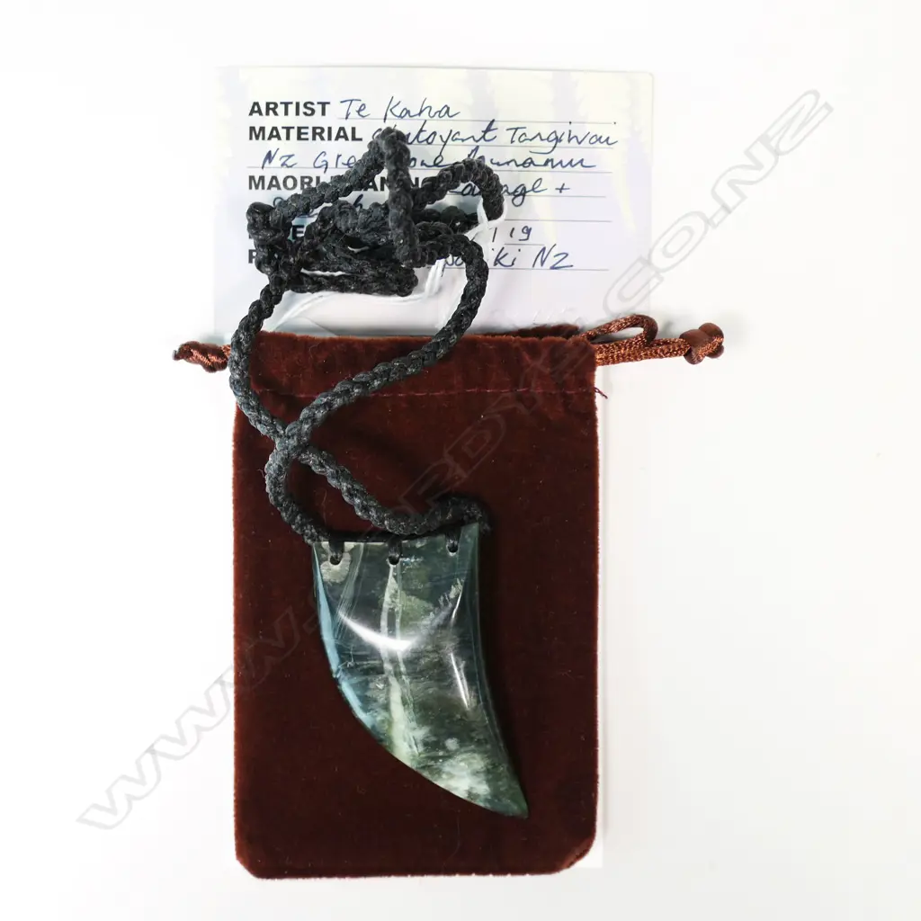 Te Kaha carved pounamu (chatoyant tangiwai) large rei niho (eye tooth) pendant, Image 1++
